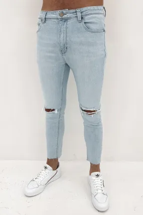 A Dropped Skinny Jean Mirror Blue Rip