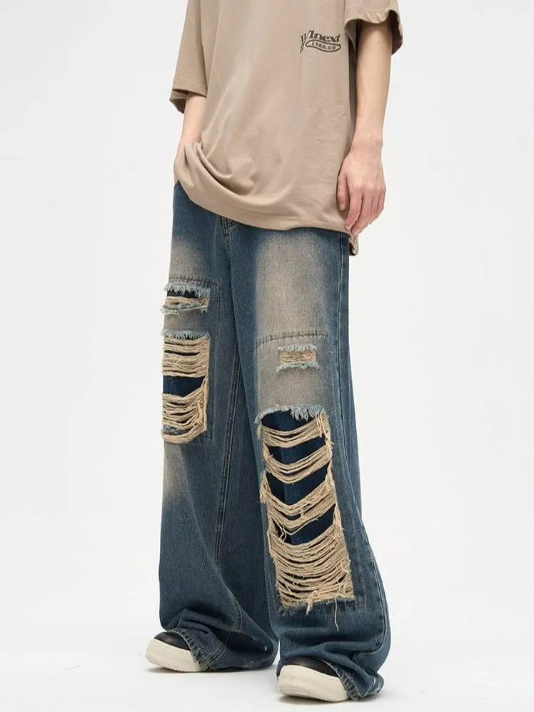 Faded Distressed Patchwork Jeans