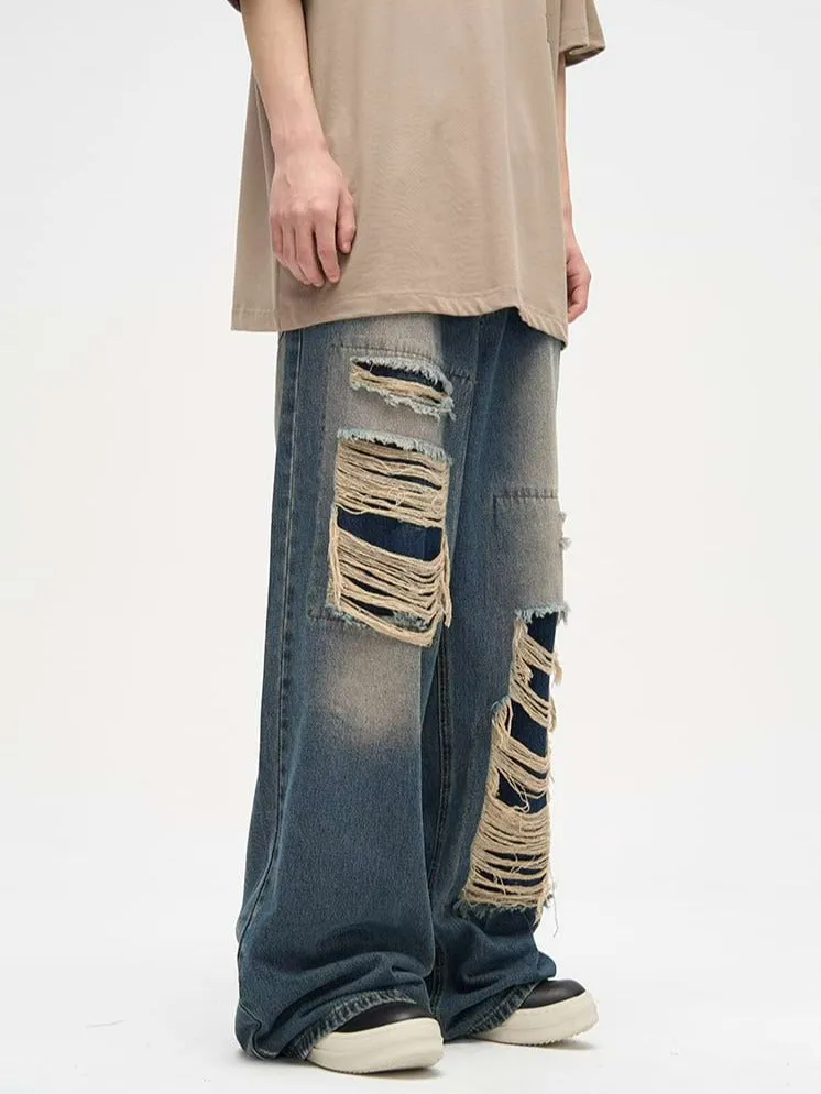 Faded Distressed Patchwork Jeans